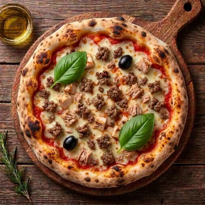 Capri — Sauce tomate, fromage, viande hachée, thon, olives — Pizzeria ILYES Oran