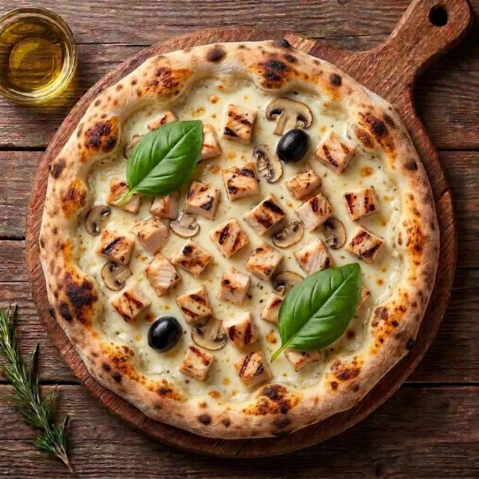 Indienne — Sauce tomate, fromage, poulet, champignons, olives — Pizzeria ILYES Oran