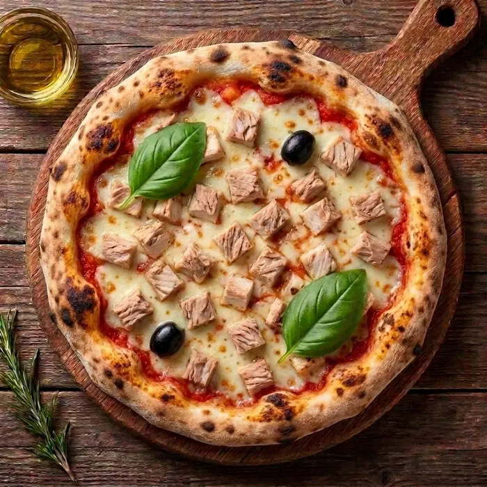 Sicilienne — Sauce tomate, fromage, thon, olives — Pizzeria ILYES Oran