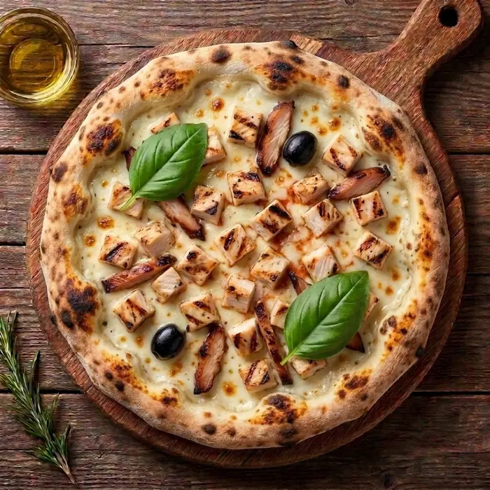 Suprême — Sauce blanche, fromage, poulet, dinde fumée, olives — Pizzeria ILYES Oran